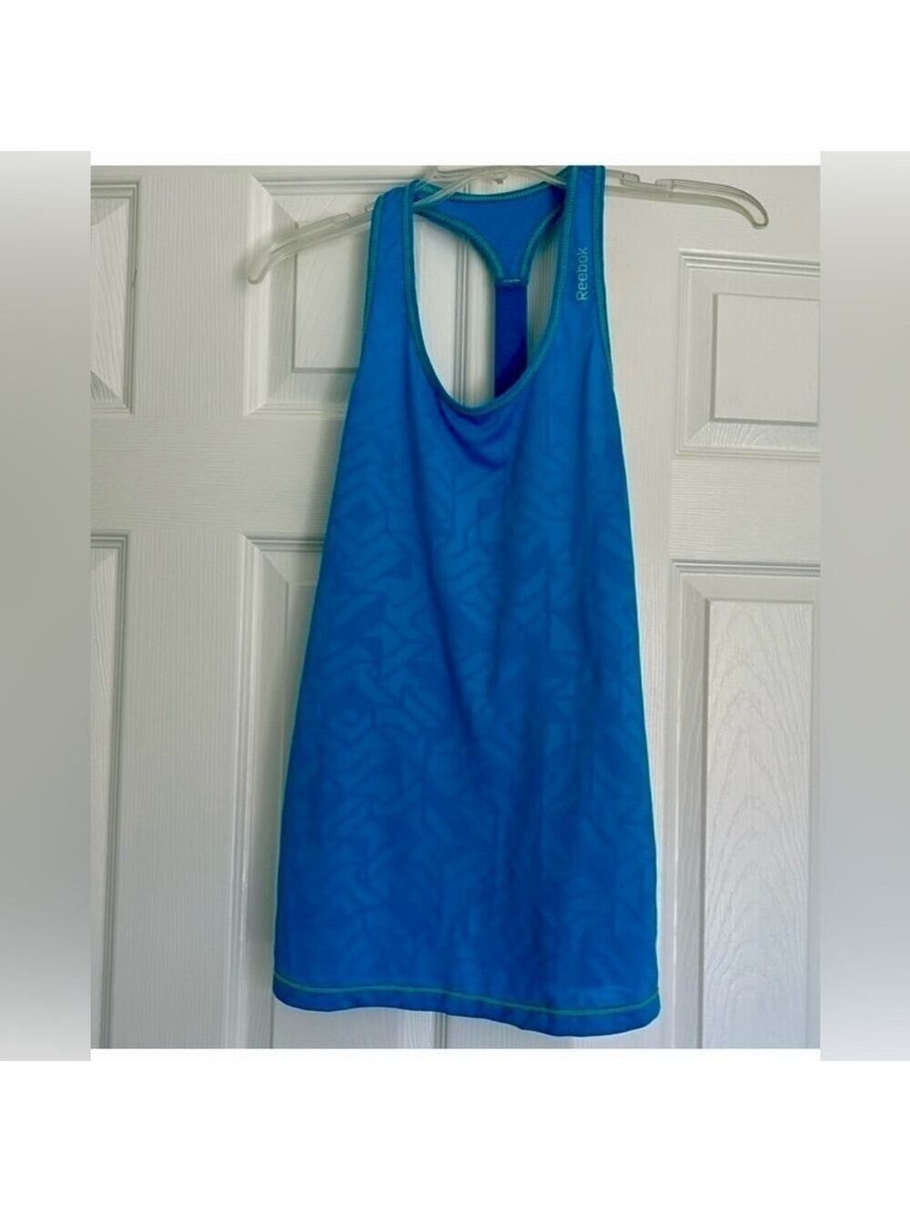🔵Reebok women’s racerback tank S